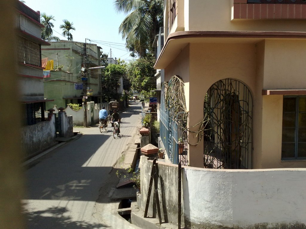 Talbagan Main Road by Arijit Banik