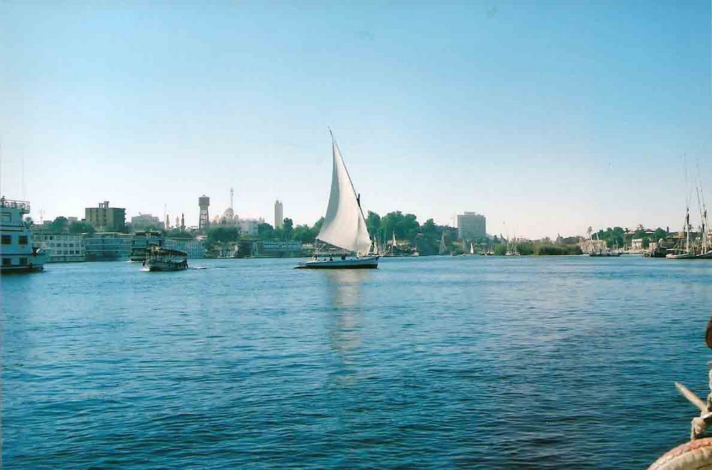 Aswan with a Felukka on the Nile by koen schenke