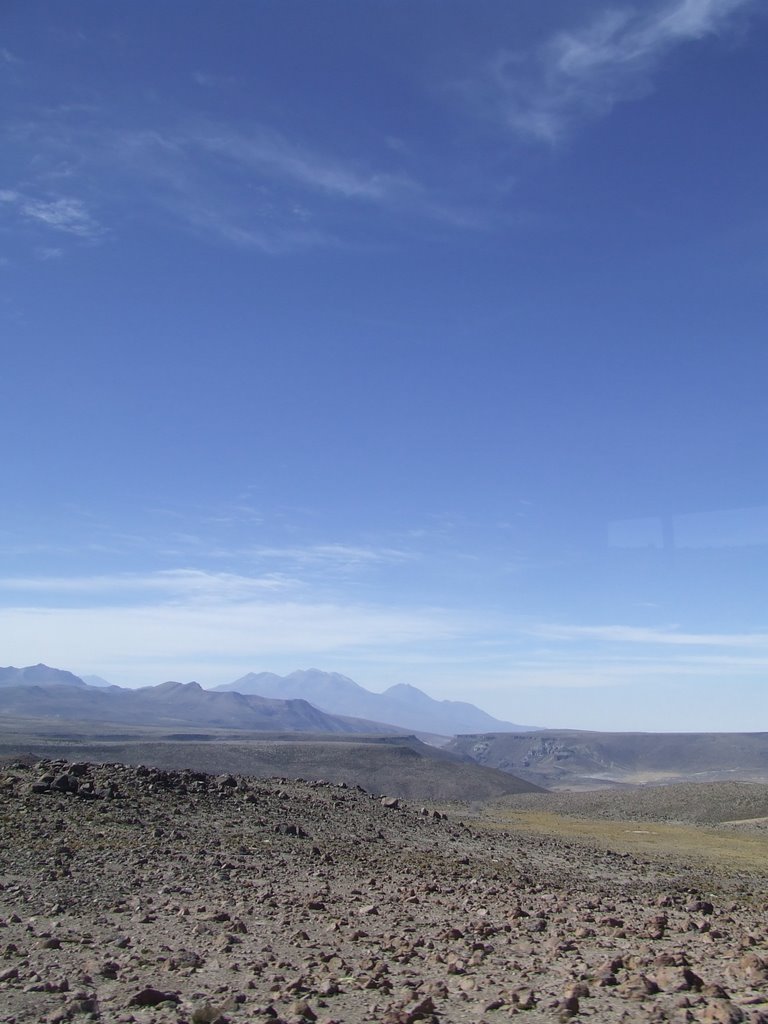 Rocky plains with view of volcano (Chachani?) above Chivay by Arthur Harvey