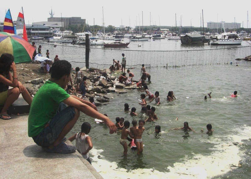 Swimming near Manila Yacht Club by Reden Dizon