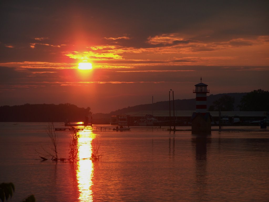 Light House at sunset by kboatman1976