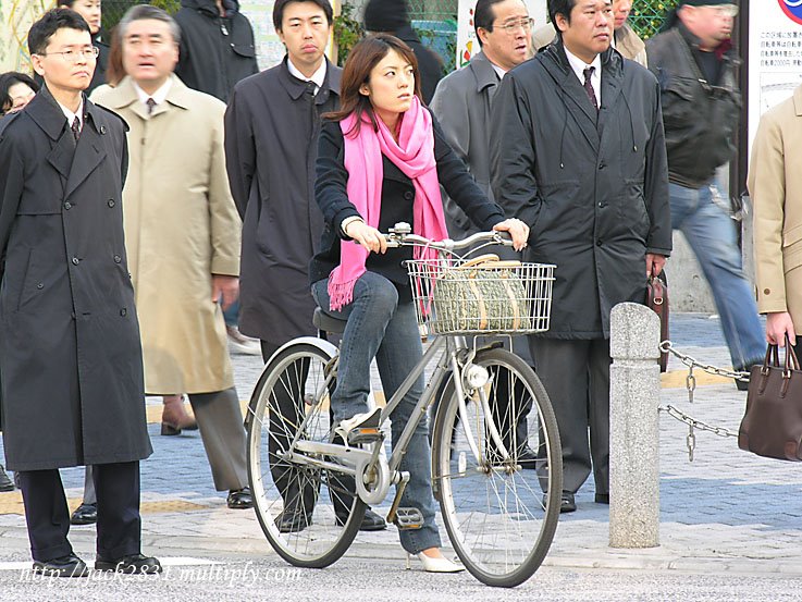 Tokyo girl on bicycle by jack2831