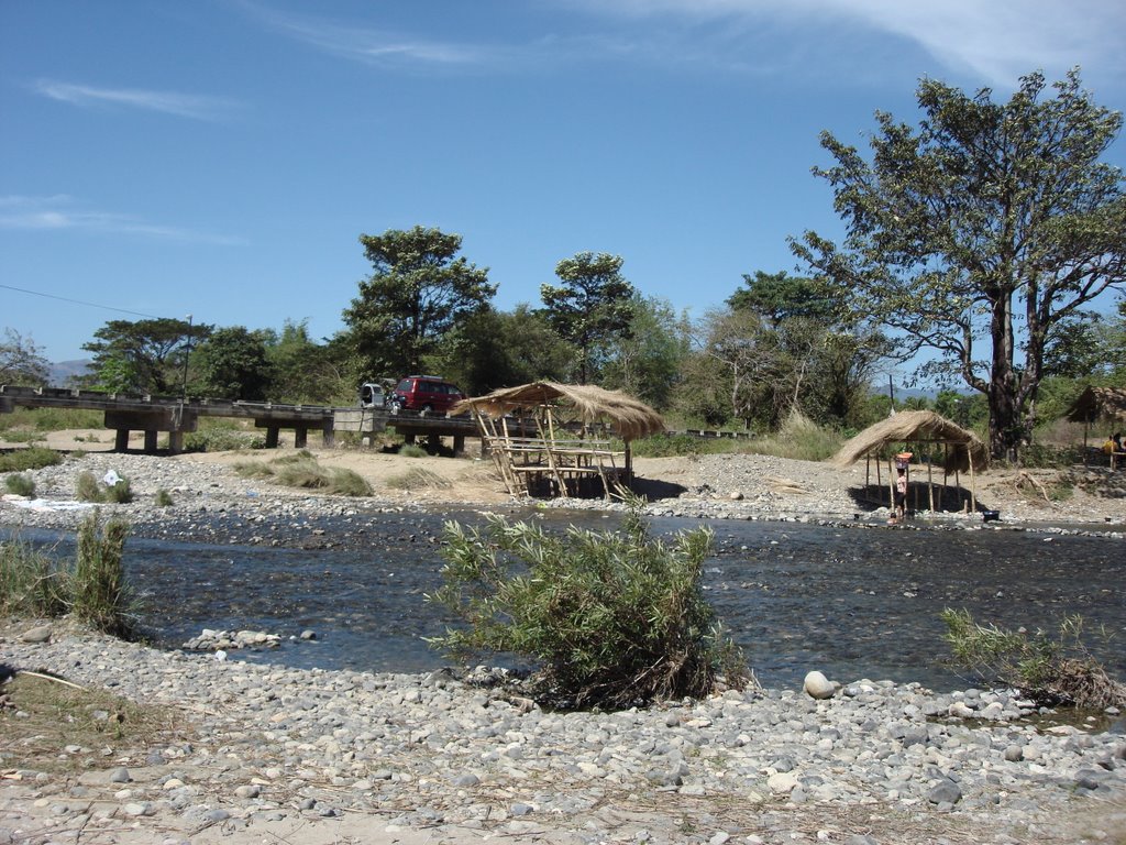 San Juan, Abra river with low flood bridge and picnic sheds by chinofer