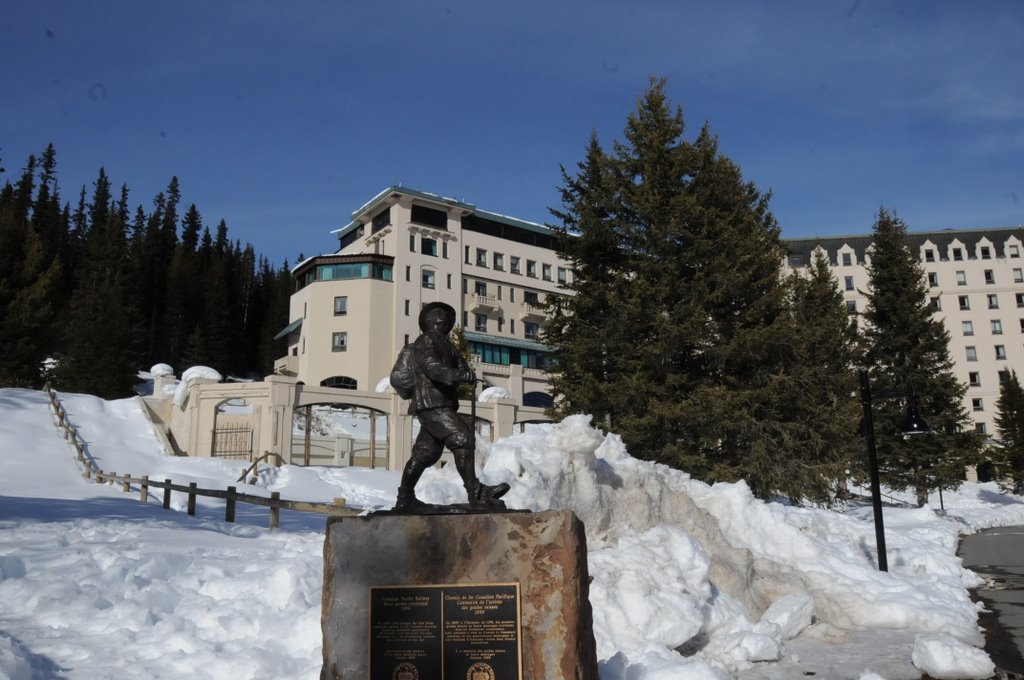 Little statue of explorers-Lake Louise. by Tony