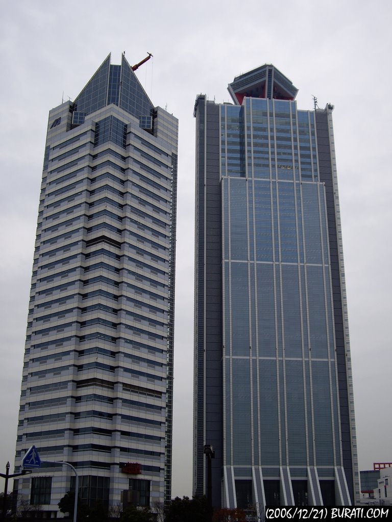 Two Giants: Mizuno Crystal Building and World Trade Center World Trade Center Building (Cosmo Tower) by Johan Burati