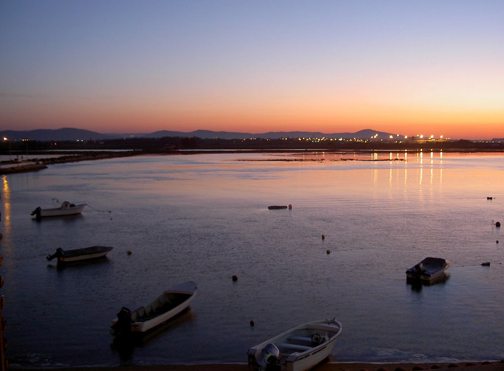 Faro from Aeromar, Faro Praia, Algarve. by Clive Pople