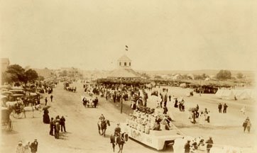 Parade in front of the original Vriens Kierka by Pioneer Museum