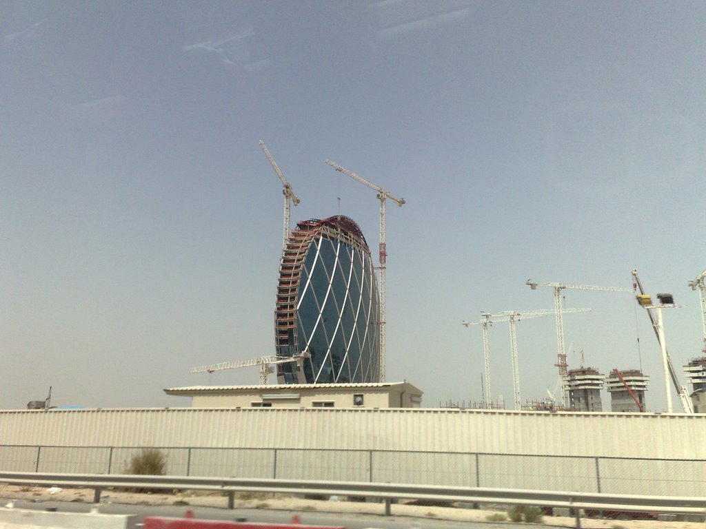 ALDAR Headquarters Circular building - side view - u/c by Shrung Vachhrajani