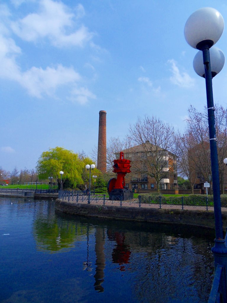 Incinerator chimney (built 1947) and unknown machine, Millwall Outer Dock by MisterCormorant