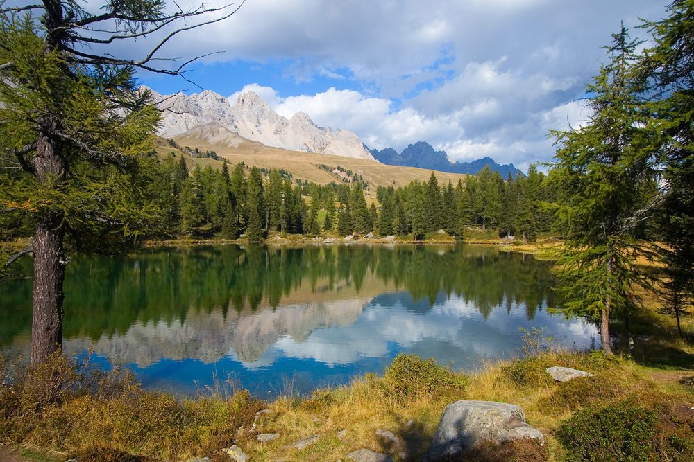 Cima Uomo reflection in Lago di San Pellegrino by Jerzy Bartosik