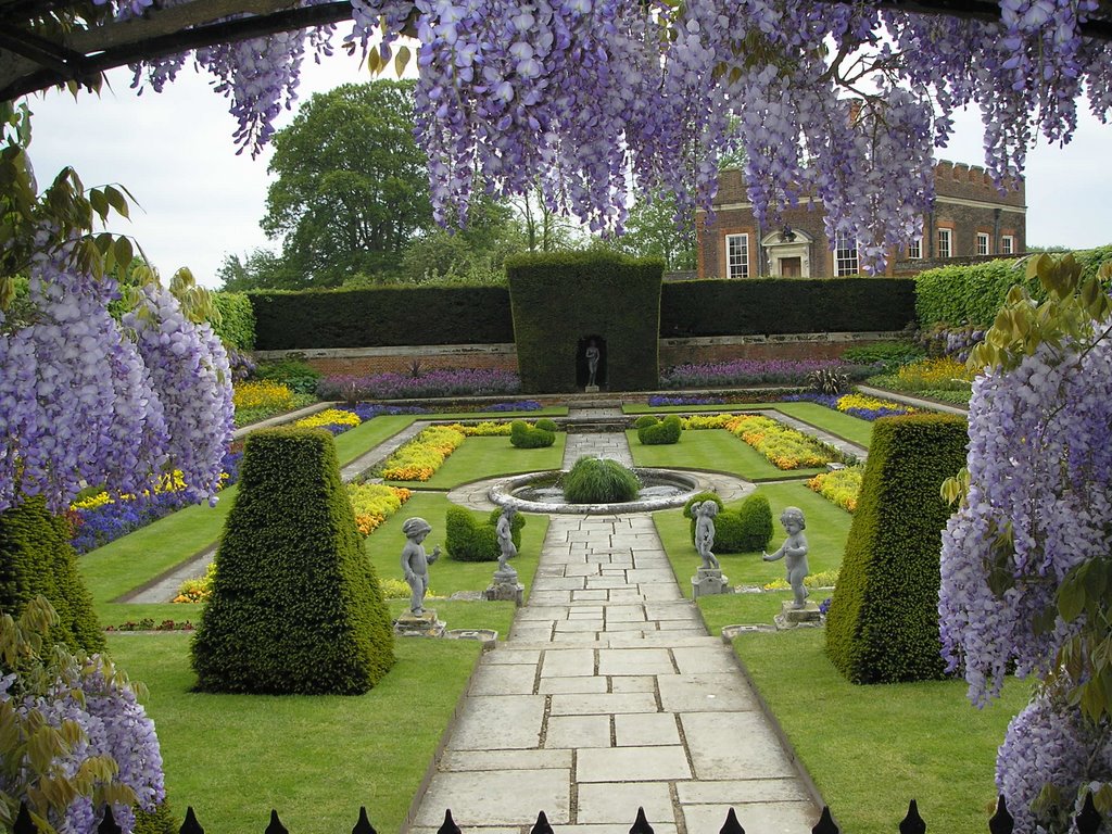 Hampton Court Palace formal gardens, beside the Thames river, west of London. by loronb