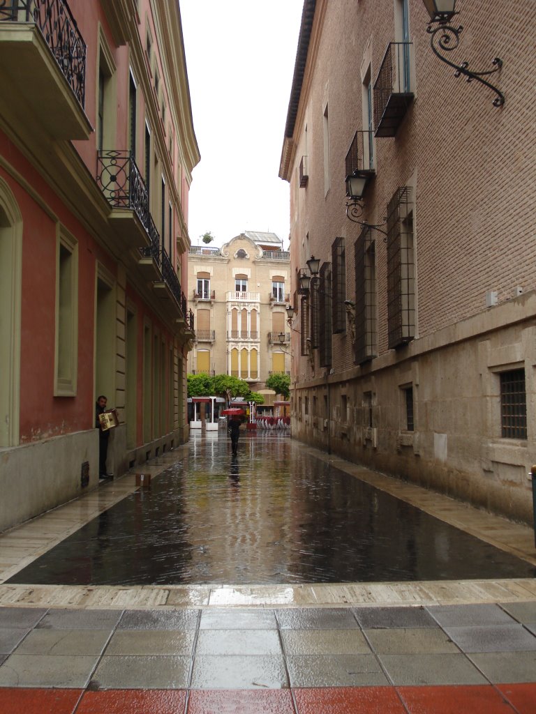 Calle Arenal bajo la lluvia by Rufino Jiménez