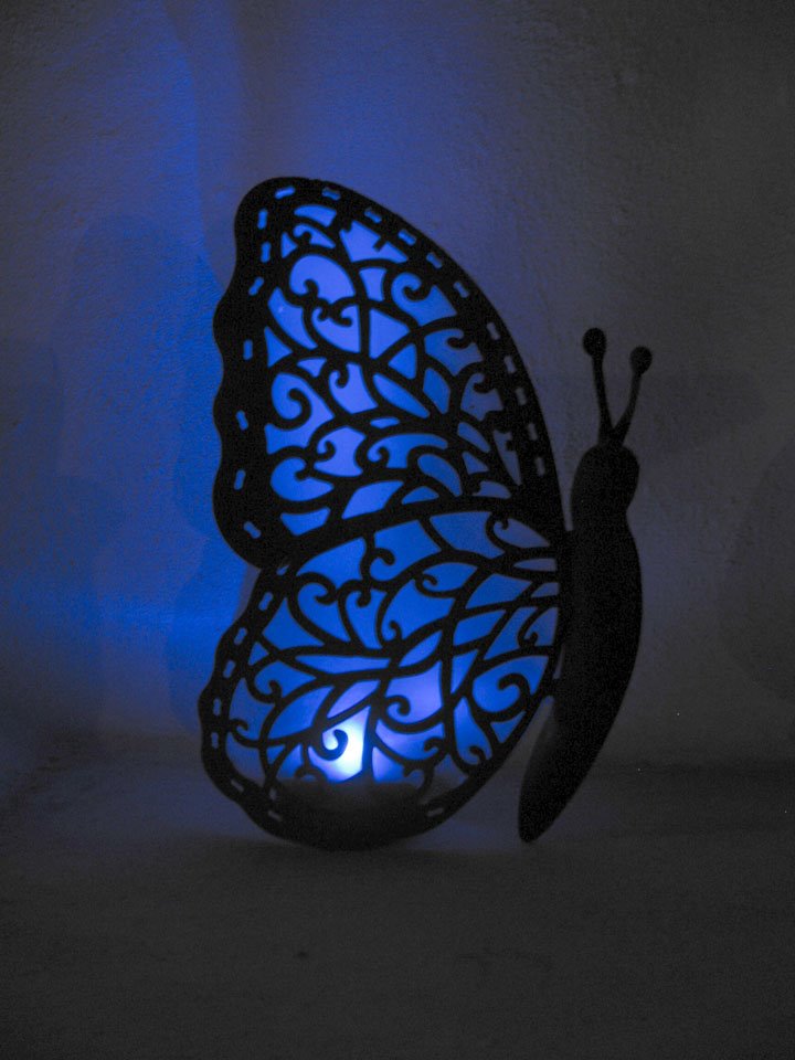 Butterfly night light along pool at "Casamel" by B. Cannon