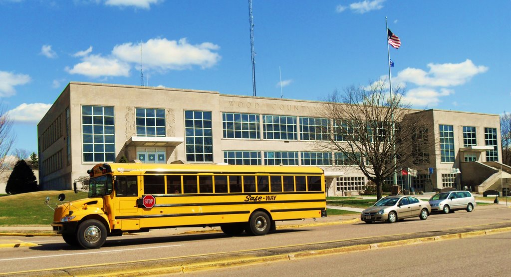 American Yellow School Bus Outside Wood County Court House, Wisconsin Rapids by farmbrough