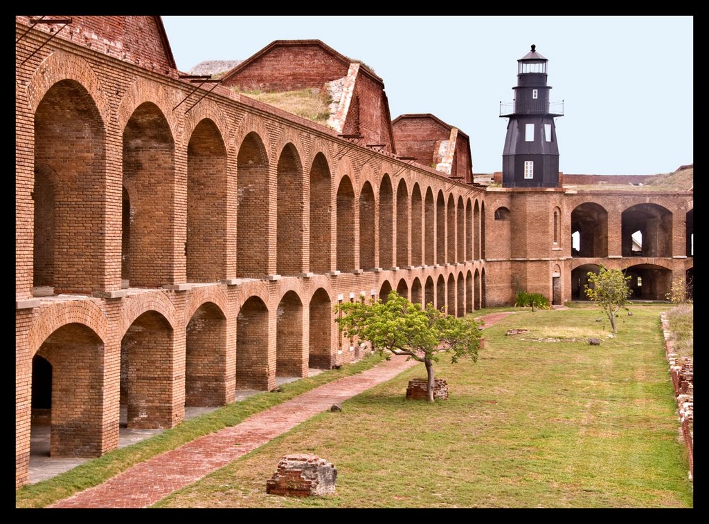 Fort Jefferson brick arches interior area with view of lighthouse by Roberto Portolese St…