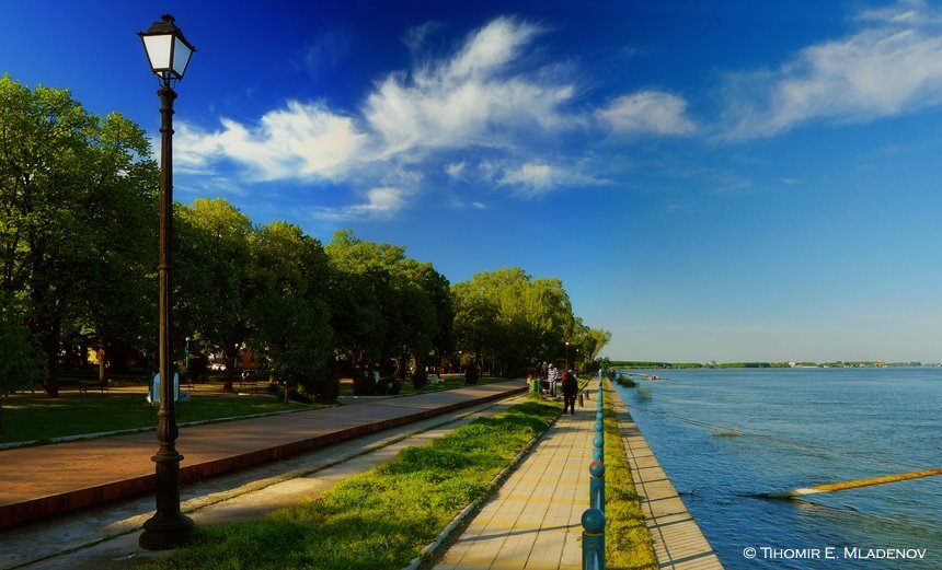 Walking along the dike by Tihomir E. Mladenov