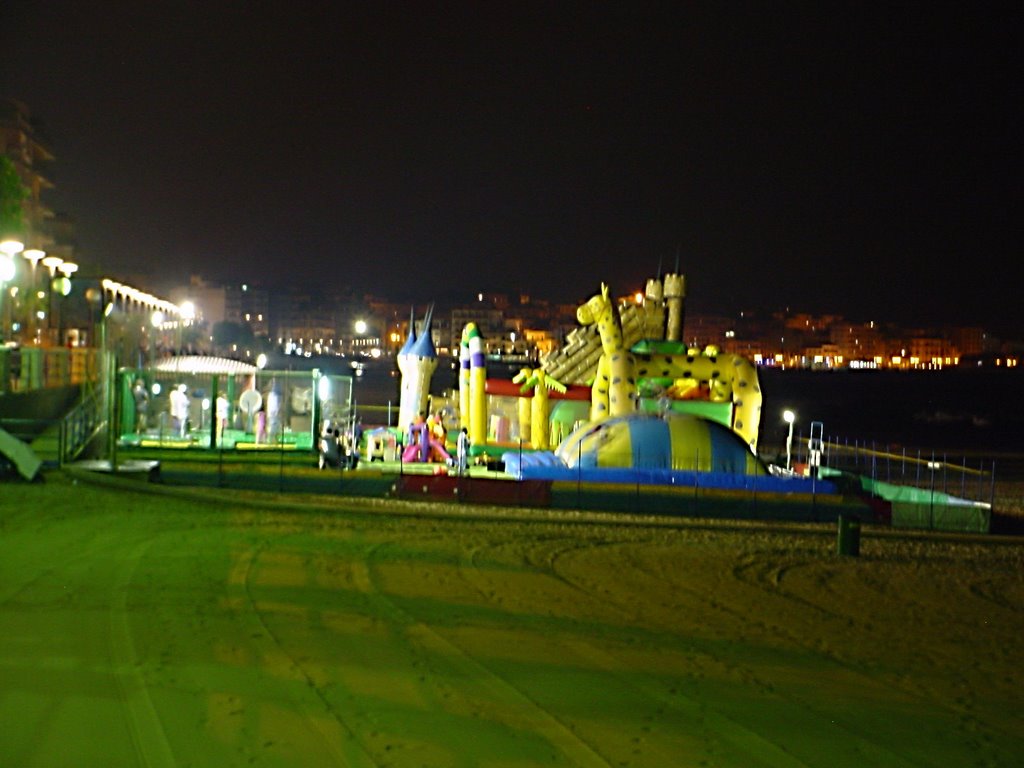 Crotone by night. Walking along the Waterfront. by IaaS