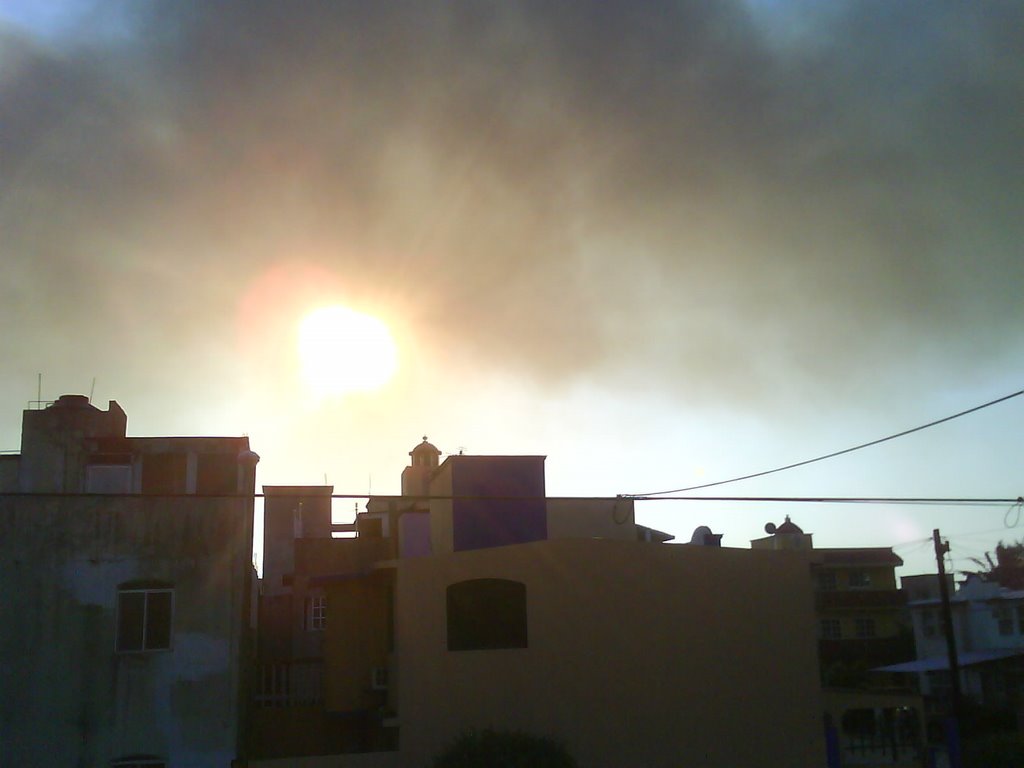 Atardecer con humo by evangeliox