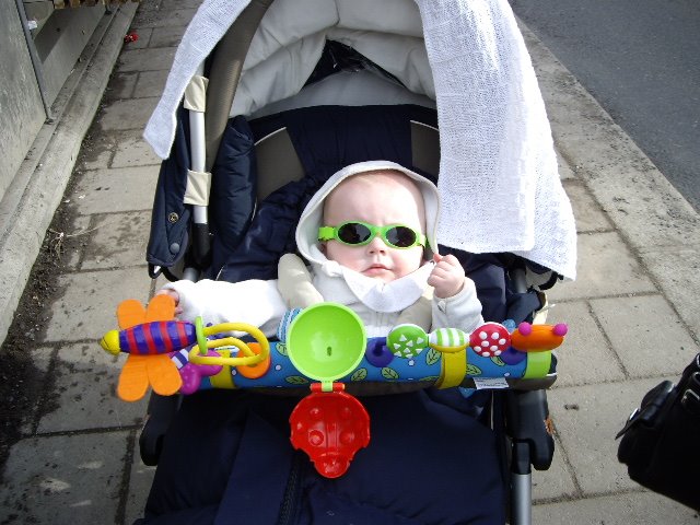 Child with sun glasses in Norway by josu_sierra