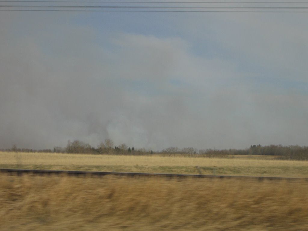 Smoke And Haze From a Massive Wildfire Out of Control Near Hobbema AB South of Edmonton by David Cure-Hryciuk