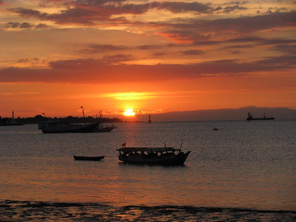 Dili harbour sunset by don.f