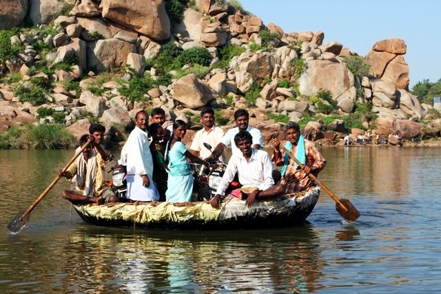 Hampi_ferry at modern bridge by Grzegorz K