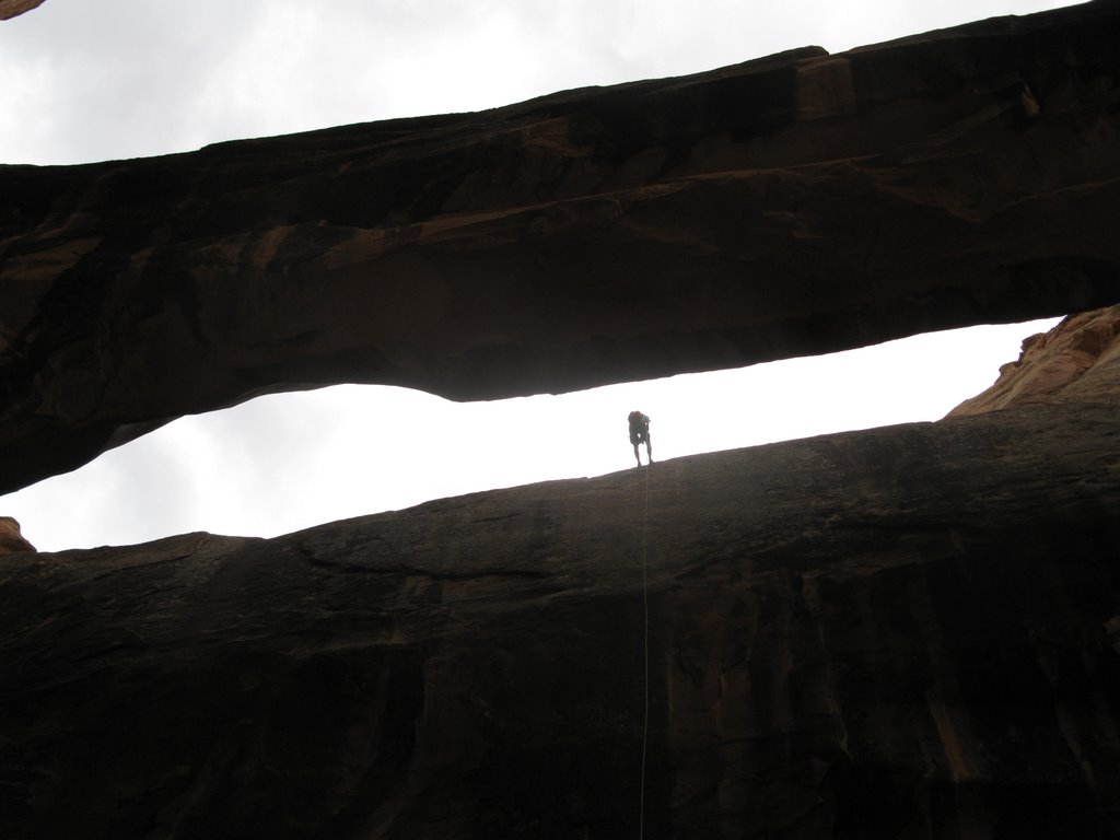 Rappelling behind Morning Glory Arch near Moab, Utah by busterbluth52