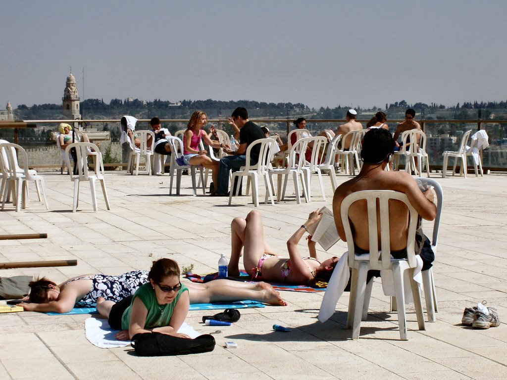 Sunbathingonroofofjerusalempearlhotel by jason friedman