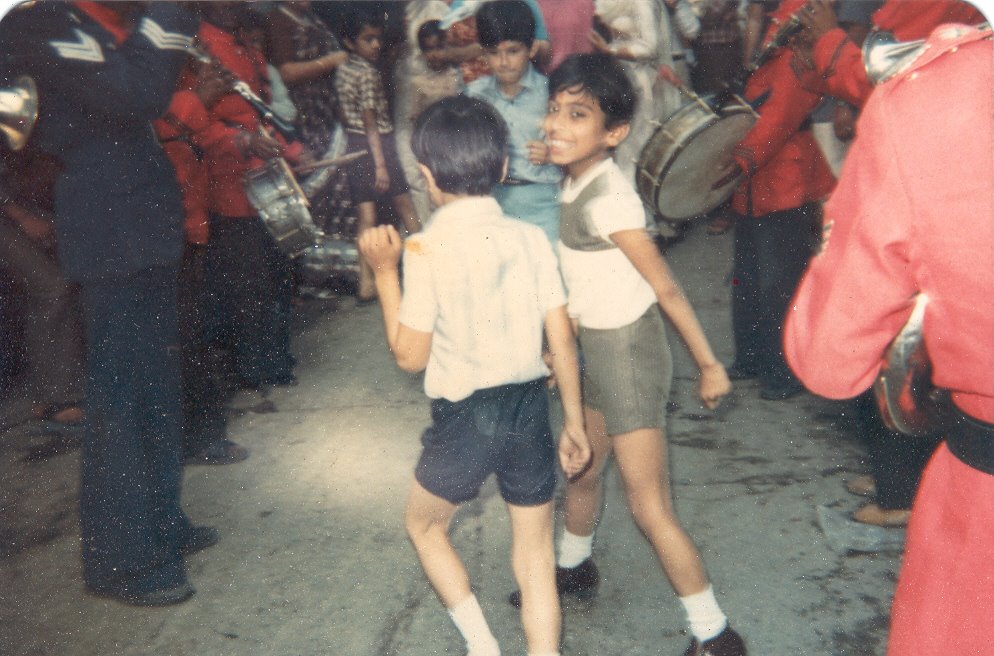 Indian Hindu Rite, Mundan Sanskar, Vaibhav in 1985 at Shitla Mata Mandir, Doonga Hanuman, Guru Bazar, Amritsar, cousins dancing in streets in celebrations by Parbodh C Bali