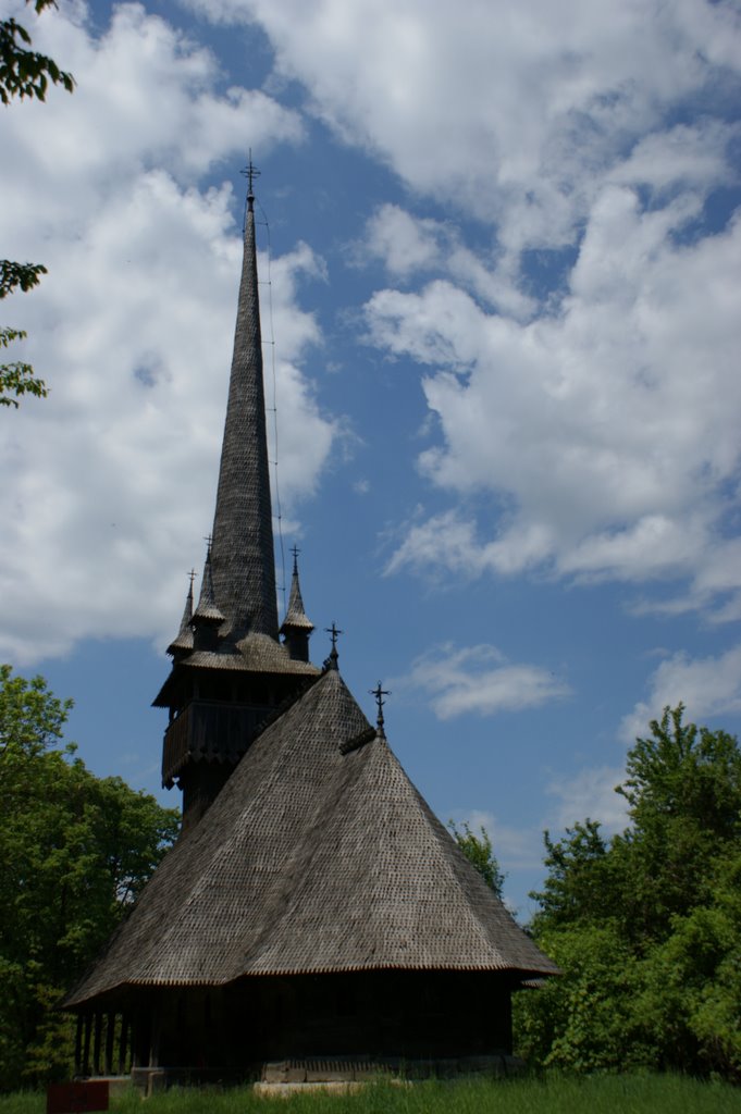 Wooden church in the village museum by Caraba