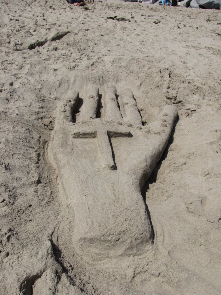 Hand Of God Carved In The Sand by montes994