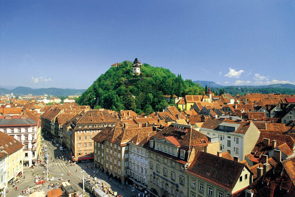 Daecherlandschaft und Schlossberg mit Uhrturm by Michael Steinberger