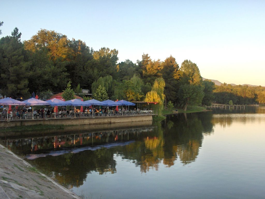 Restaurant by the artificial lake by Mend Zavalani