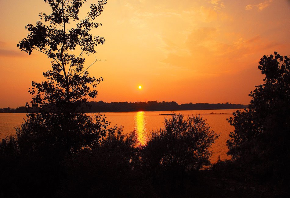 Sunset over Guelph Lakes, near Guelph ON. by Chuckels