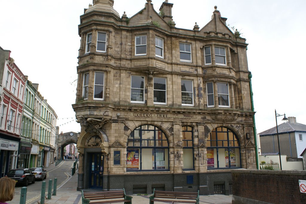 This fine building is a bookmakers and has trees growing on the roof by Bigdutchman