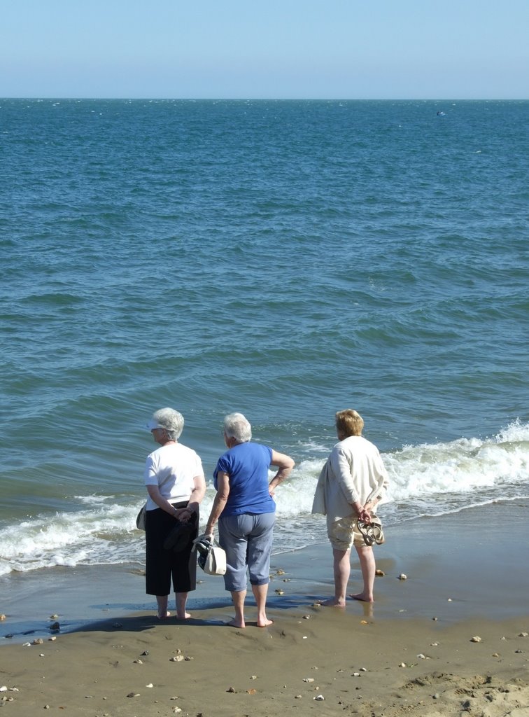 The beach, Shanklin. [Ada (looking out to sea): "A yacht". Edie (looking at her feet): "I'm boiling, what about you?"] by John Goodall