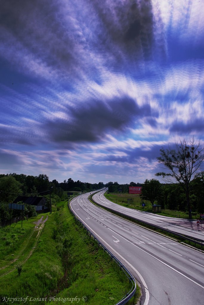 Empty highway by Krzysztof Lorant