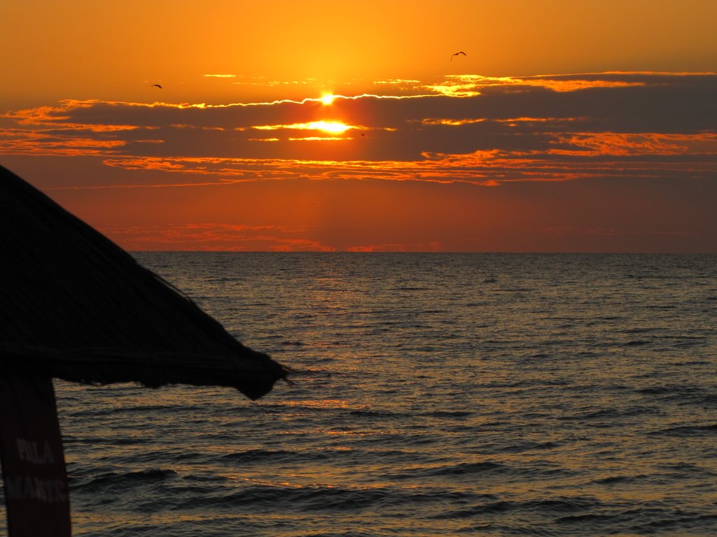 Sunrise on the beach in Mamaia by gabiavram