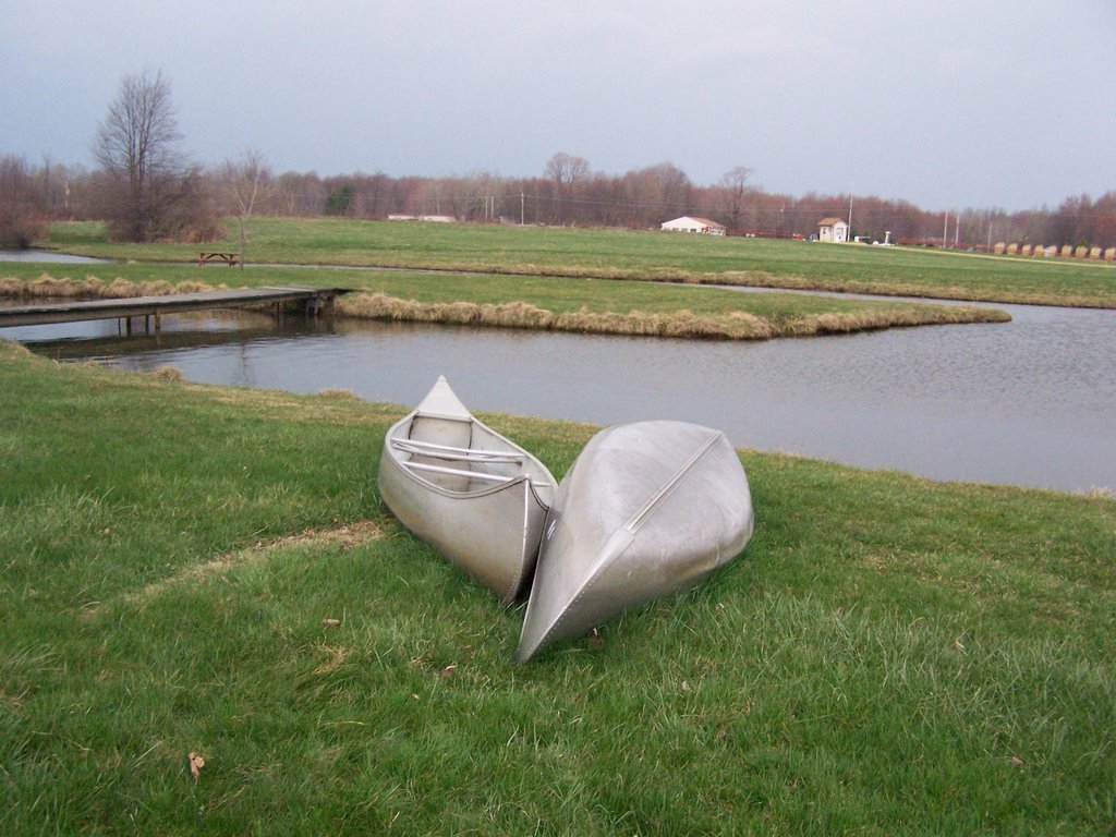 Canoes by the Lake by E.Chappell