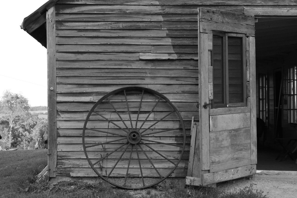 Old fashioned door+wheel+house @ Pizza on the farm, Stockholm, WI by tonibcn