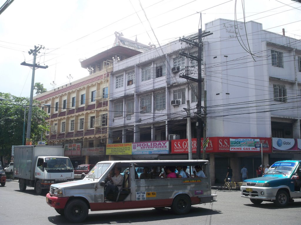 Right next to the white R. Woo bldg stands this architecturally chinese inspired commercial building along Ledesma St. in Iloilo City, Iloilo, Panay Island, SE by kang © francis b i ♣