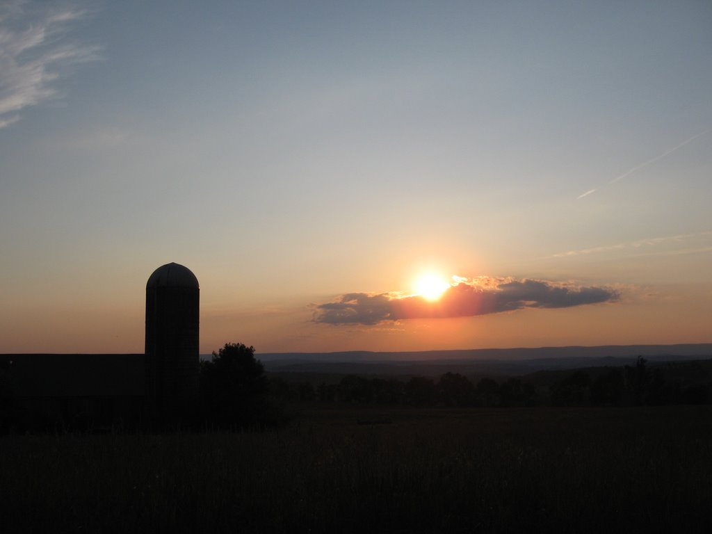 Sunset over a farm by alchemist_x