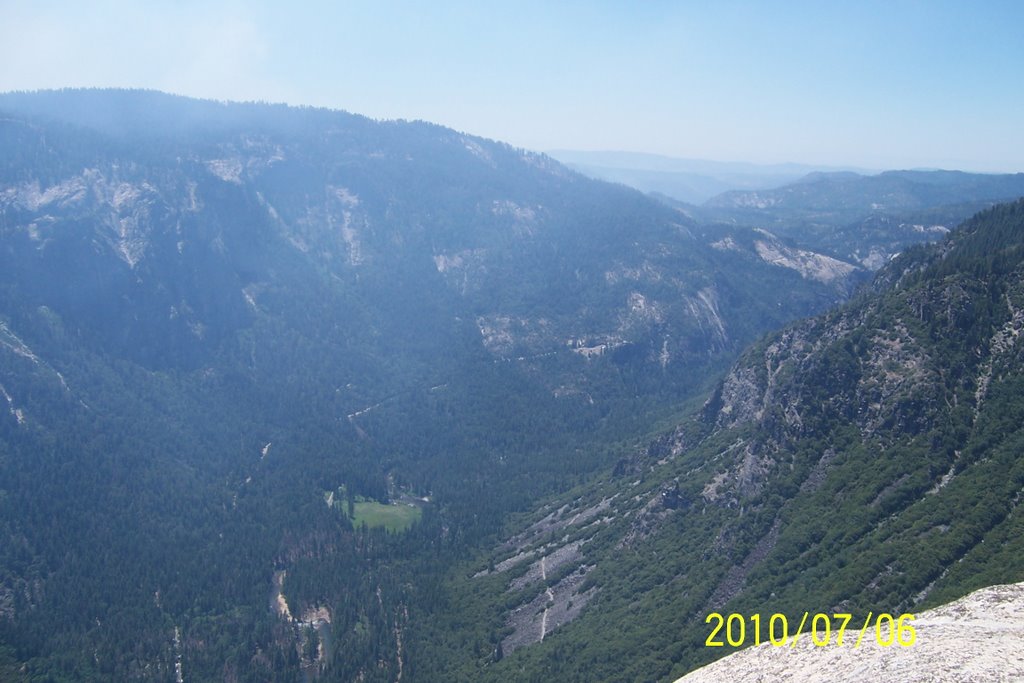 Looking down west the valley from the edge of El Capitan( haze from wildfires is visible) by Interkot