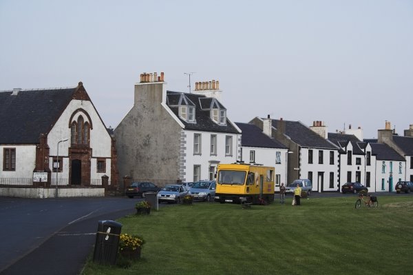 Port Ellen church with Fish & Chips car by Quevaal