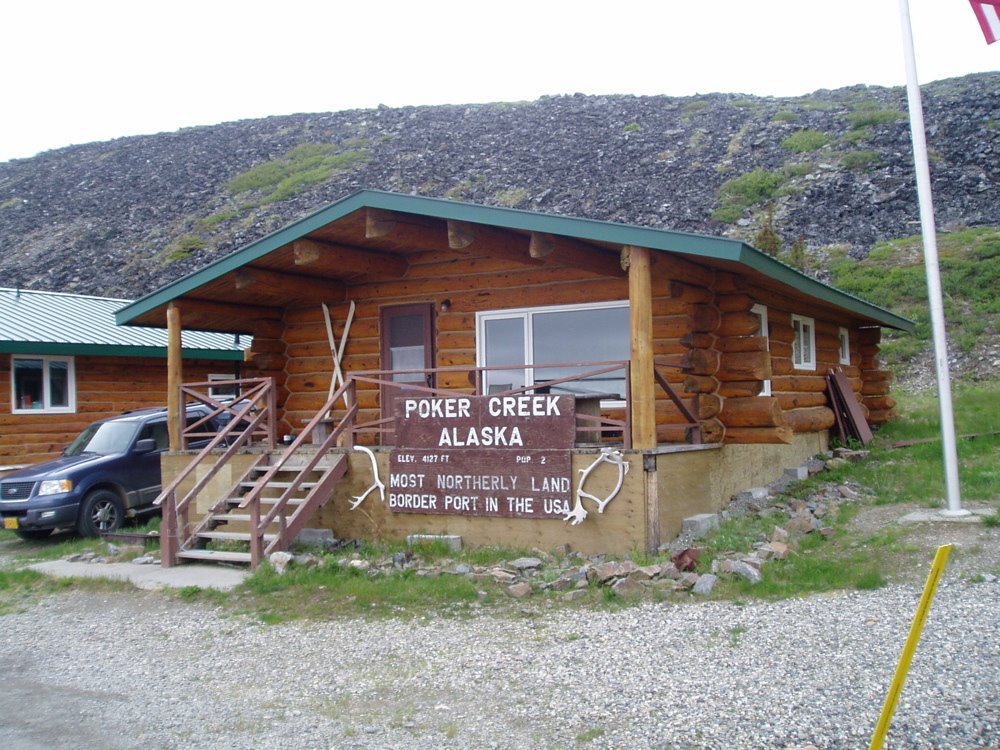 USA land border post. Poker Creek AK by Jannich Nielsen