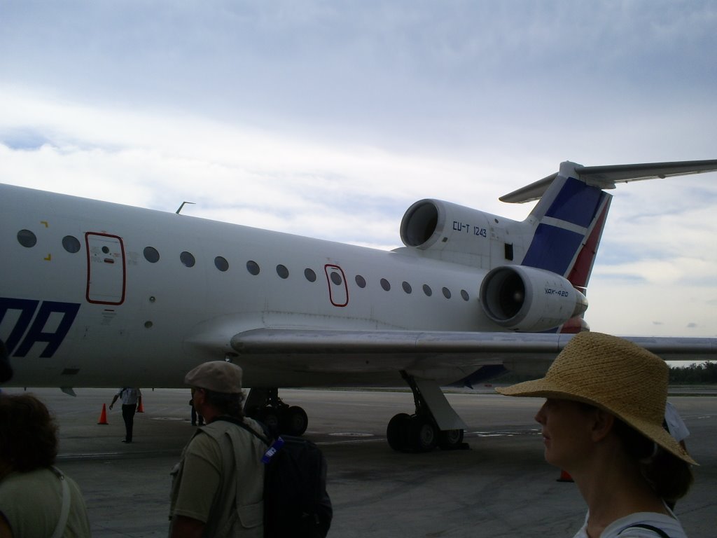 Boarding Cubana Plane at CUN Runway by ajbeckham