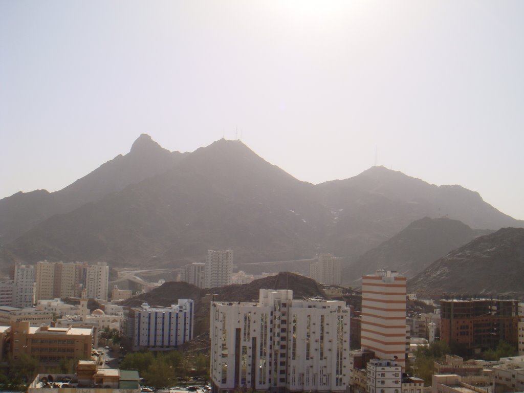 Modern Buildings & Mountain Peaks by Abdullah Nouman