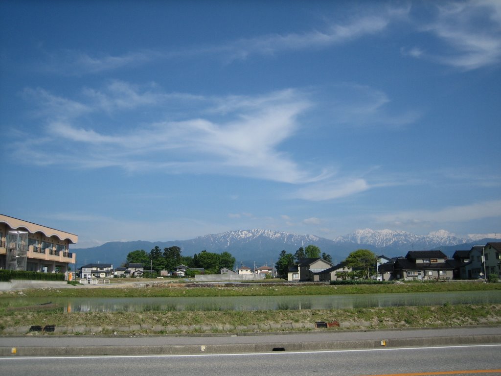 View of the Japanese Alps from Shinkiro Road, Uozu. by Adam Matthews