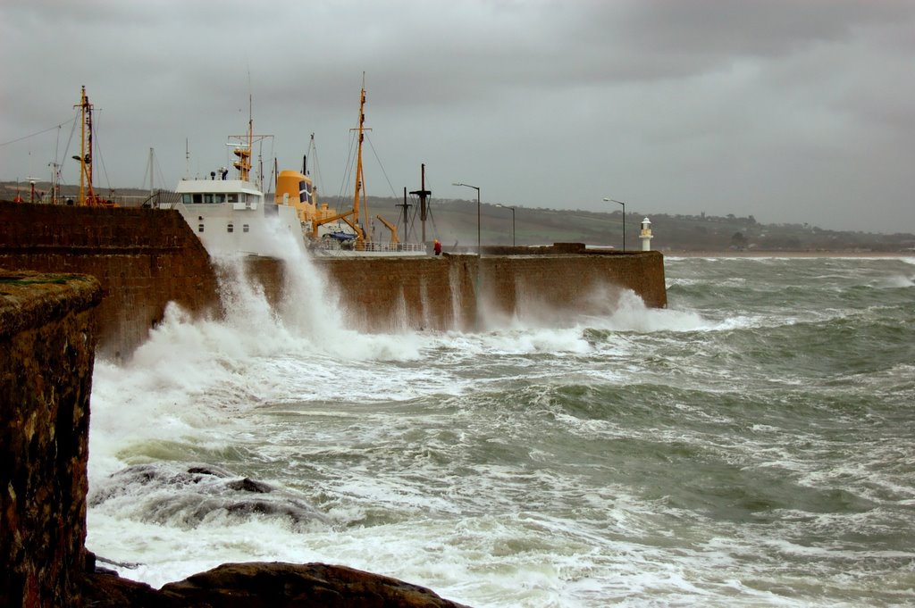 Winter storms hit the pier in Penzance harbour by Chris Scaysbrook