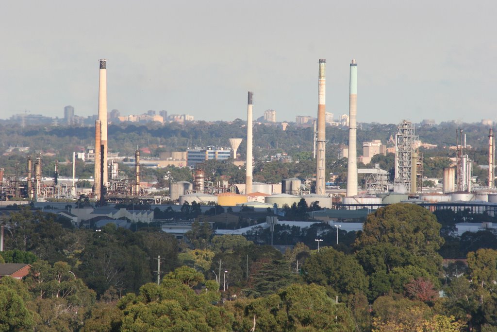 Shell Oil Refinery, Granville with Hurstville high rise on the horizon by Ian Stehbens